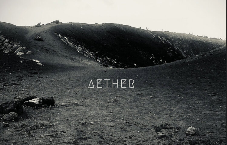 Aether - Aether cover artwork. A black and white picture of a mountain volcanic landscape.