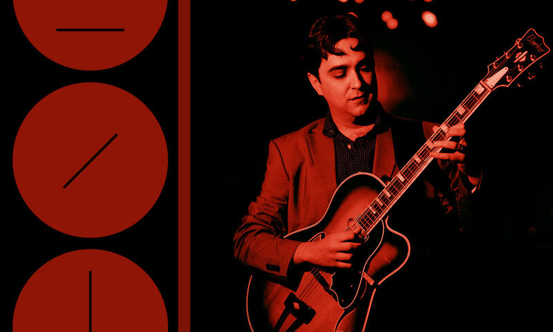 The album cover for Andy Pratt Trio features a red-and-black color scheme with a moody, jazz-club ambiance. On the right, guitarist Andy Pratt is shown mid-performance under a starburst-style ceiling light. On the left, three red circles contain minimalist black slashes, with “Andy Pratt” in the top circle and “Trio” in the bottom.