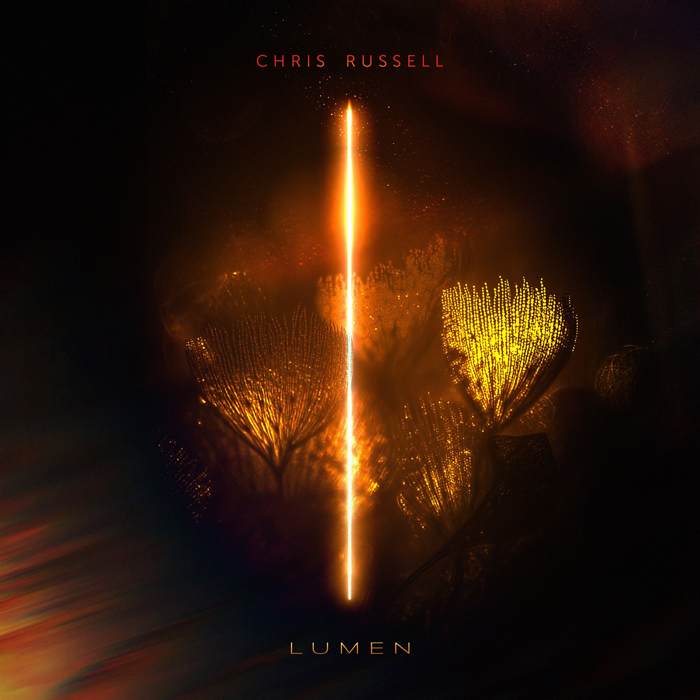 The cover centers on a vertical beam of bright light cutting through a smoky, amber-red atmosphere. On both sides of the glowing line, plant forms or seed heads appear illuminated in gold, as if lit from within. The artist name “Chris Russell” sits near the top in small red lettering, while the title Lumen appears at the bottom in spaced gold text.