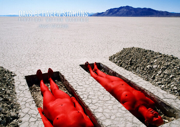 Days Between Stations -Perpetual Motion Machines cover artwork. Two naked bodies painted red lying face up in shallow graves in a flat field.