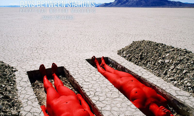 Days Between Stations -Perpetual Motion Machines cover artwork. Two naked bodies painted red lying face up in shallow graves in a flat field.