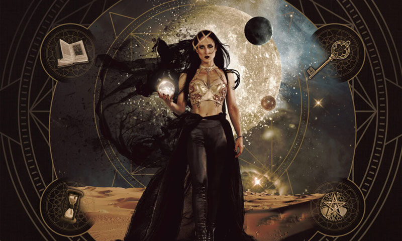 The album cover for Deep Sun – "Storyteller" features a fantasy-inspired design. At the center stands a powerful woman in black, wearing an ornate gold top and crown, holding a glowing orb. Behind her, a large, luminous full moon dominates a cosmic sky filled with stars and planets. Surrounding her are symbolic elements: an open book, a key, an hourglass, and a compass, all enclosed within intricate geometric patterns.