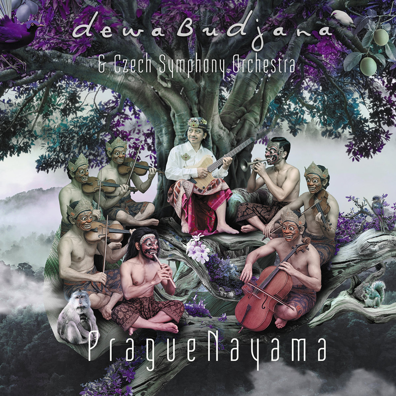 Dewa Budjana & Czech Symphony Orchestra - Praguenayama cover artwork. A photo of Dewa playing guitar, wearing traditional clothes, under a tree. He is surrounded by musicians playing instruments wearing traditional masks.