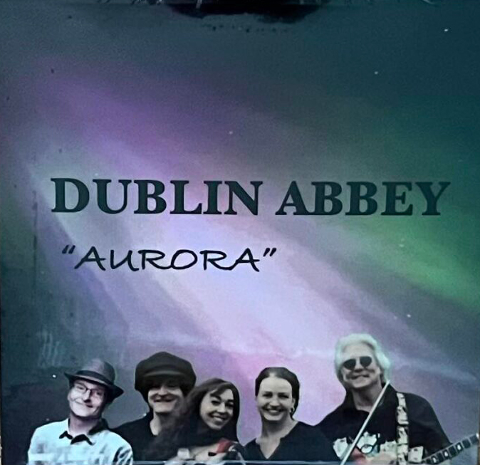 Dublin Abbey – "Aurora" cover artwork. A photo of the band.