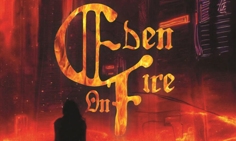 The album cover shows a fiery, apocalyptic cityscape engulfed in red and orange flames. A silhouetted figure stands in the foreground, facing the inferno. Bold, flame-styled gothic lettering spells out “Eden on Fire”, while the word “Unresolved” appears subtly in the bottom right corner.