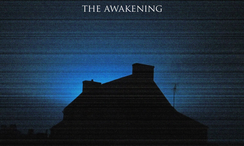 Esthesis - The Awakening cover artwork. a blue background and a dark structure in the front.