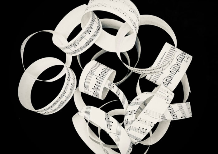 Fiona Brice - “Think Loop 3” cover artwork. An illustration of rings of sheet music looped together.