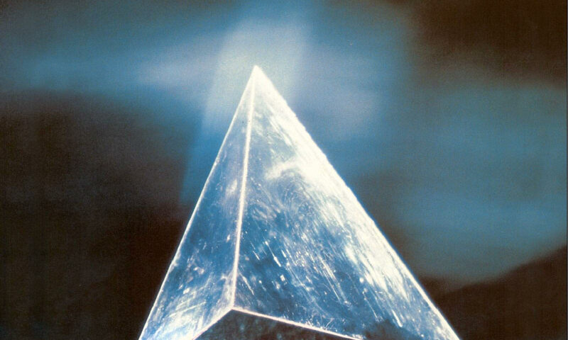 Flame Dream - Out in the Dark cover artwork. A triangular crystal prism.