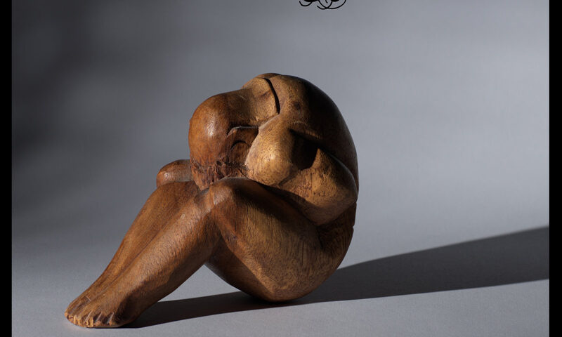 Fouette — Subliminal Message cover artwork. An image of a small humanoid statuette sitting on the floor leaning forward, with the head resting on the kneees.