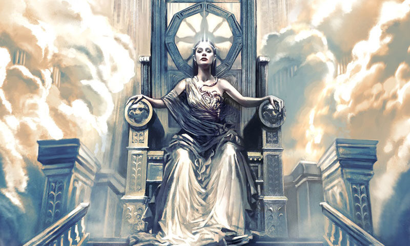 The album cover for Empires Must Fall by Ghost of the Machine features a regal, goddess-like woman seated on an ornate, towering throne. She is adorned in a flowing white and gold gown. The throne itself is intricate, with sharp, angular designs. Behind her, a dramatic sky filled with swirling clouds and golden light. The typography is bold, with the album title written in a flowing script.