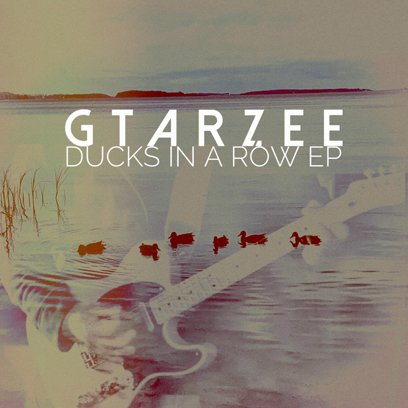 Gtarzee - Ducks in a Row cover artwork. an image of an electric guitar blended with a photo of ducks.