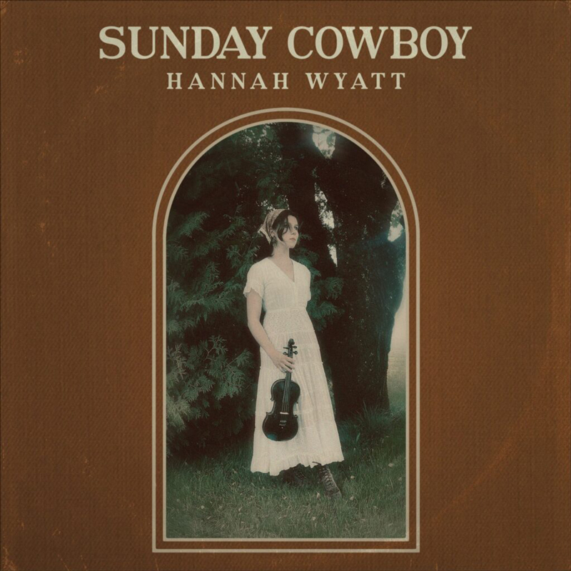 Hannah Wyatt – "Sunday Cowboy cover artwork. A photo of the artist outdoors holding a fiddle.