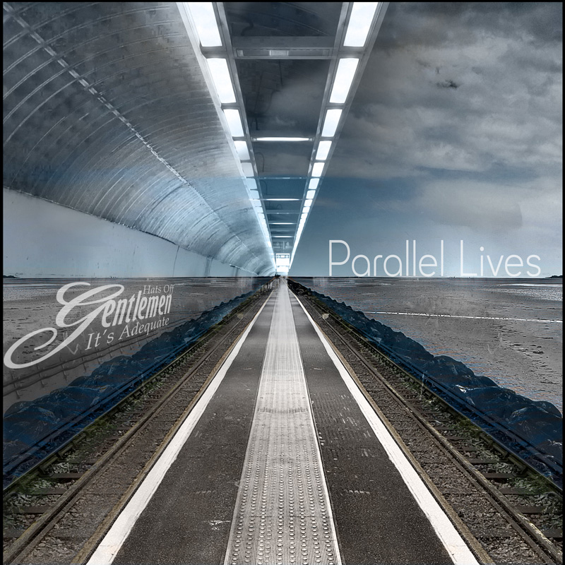 Hats Off Gentlemen It’s Adequate – Parallel Lives cover artwork. The cover features a railway platform that stretches into a bright vanishing point. The image is split between two parallel worlds: a curved, tunnel-like structure on the left and a stormy coastal landscape on the right.
