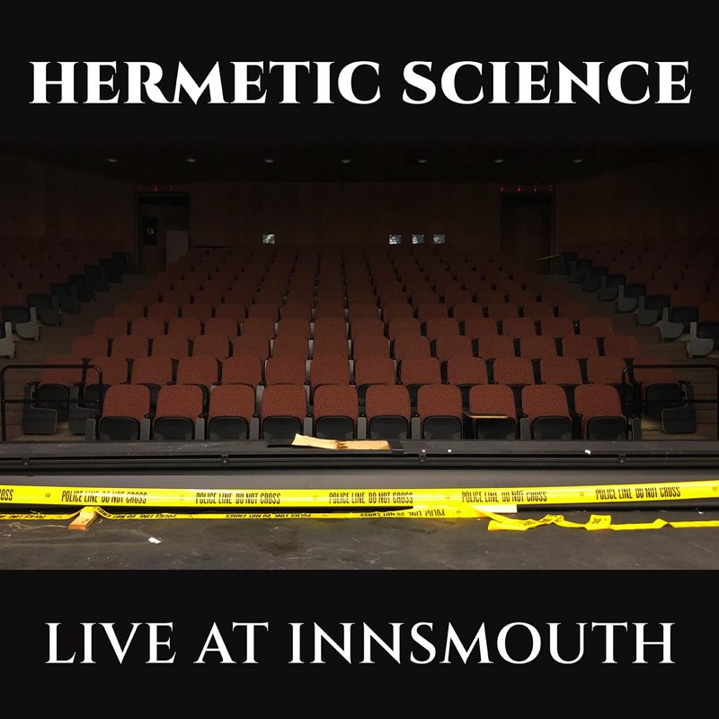 The album cover shows an empty theater with rows of red seats, viewed from the stage. Yellow police tape stretches across the front. The title Hermetic Science appears at the top, and Live at Innsmouth is written at the bottom in bold white letters.