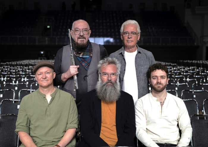 Jethro Tull band photo posing inside as theater.