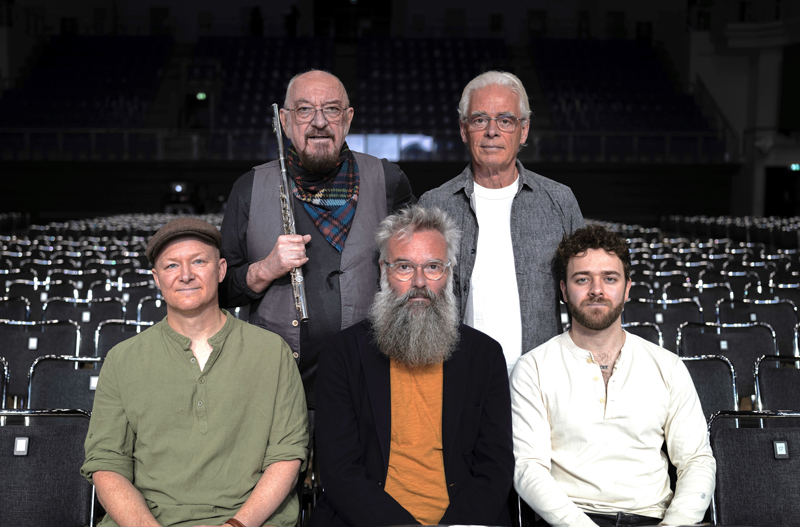 Jethro Tull band photo posing inside as theater.