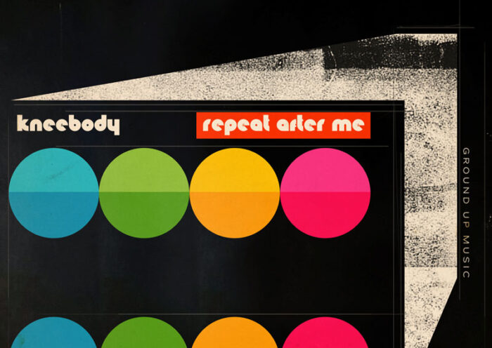 The album cover for Repeat After Me by Kneebody features a modernist design with a black background. The artwork includes six colorful, bisected circles arranged in two rows, using blue, green, yellow, orange, and pink hues. The typography is retro-futuristic: "kneebody" appears in lowercase, cream-colored letters, while "repeat after me" is set in a red rectangle with rounded white text. A geometric, textured white shape extends from the right side. The right edge also features the text "GROUND UP MUSIC," indicating the record label.