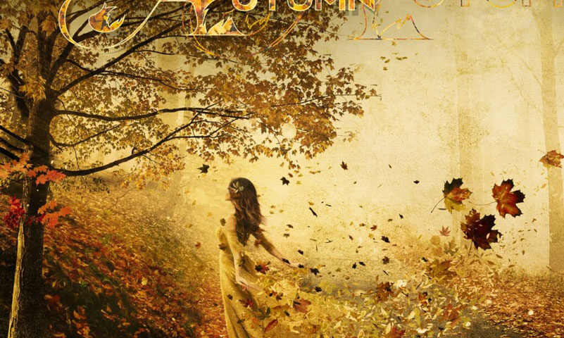 This Lay of the Autumn album cover features a warm, autumnal theme with rich golden and earthy tones. A woman in a flowing yellow dress walks through a forest path, her dress transforming into swirling leaves.