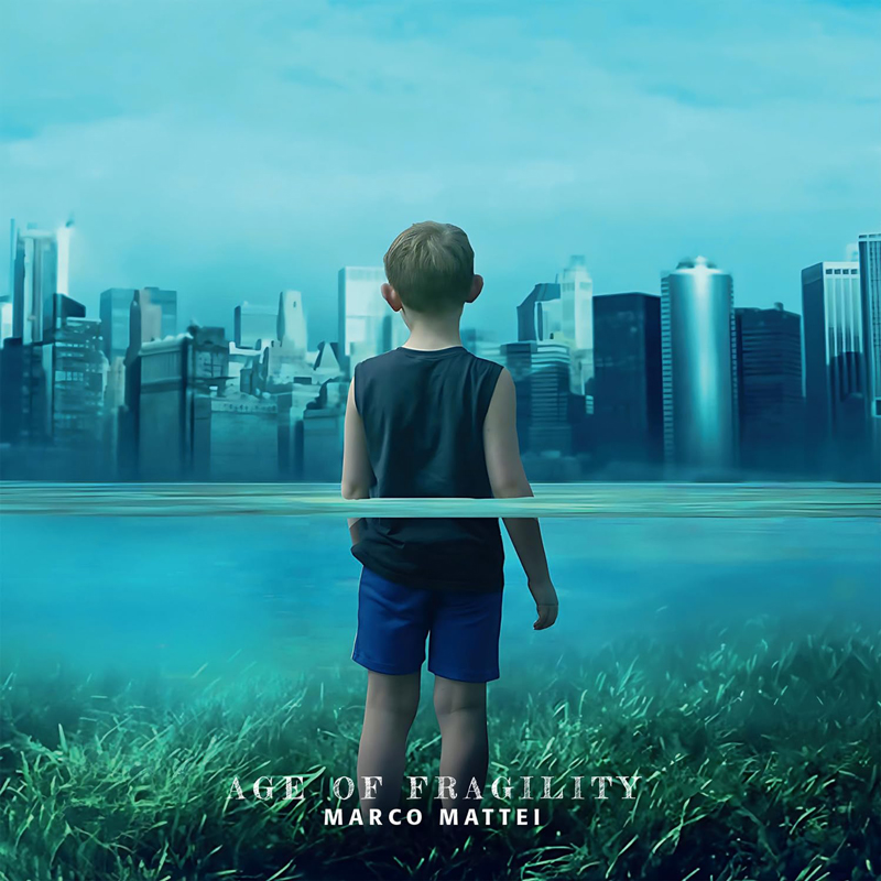 The album cover for Age of Fragility by Marco Mattei features a young boy standing in shallow water, facing a futuristic city skyline in the distance. The waterline cuts through the middle of the image, symbolically dividing nature (grass beneath his feet) and urbanization.