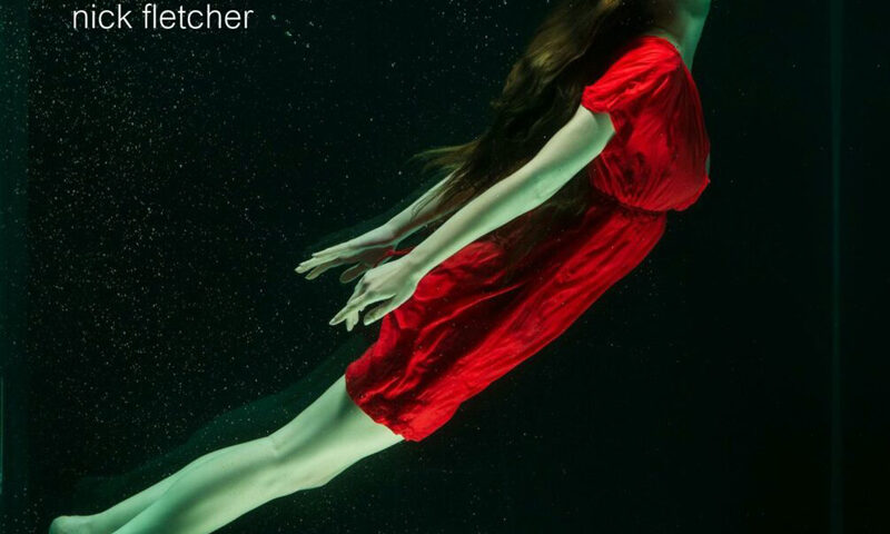Nick Fletcher – The Mask of Sanity cover artwork. a woman in a red dress breathing under water.