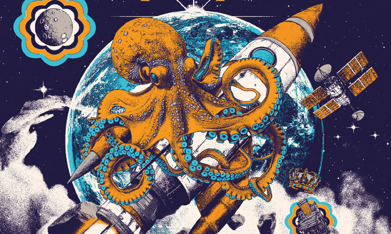 The album cover for Firebrand by Ring Van Möbius depicts a giant orange octopus wrapped around a rocket in space, with Earth in the background. Satellites and asteroids surround the scene, and the title appears in bold orange and white retro-style lettering.