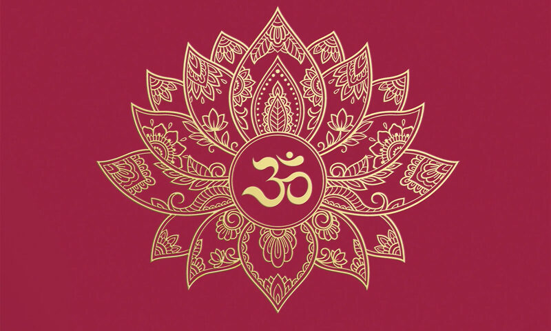 The album cover for Spellbound by Shez Raja features a deep maroon background with a gold, intricately designed lotus mandala at the center. Within the mandala’s core is the “Om” symbol, also in gold. The artist's name and album title appear in the top left corner in gold serif typography.