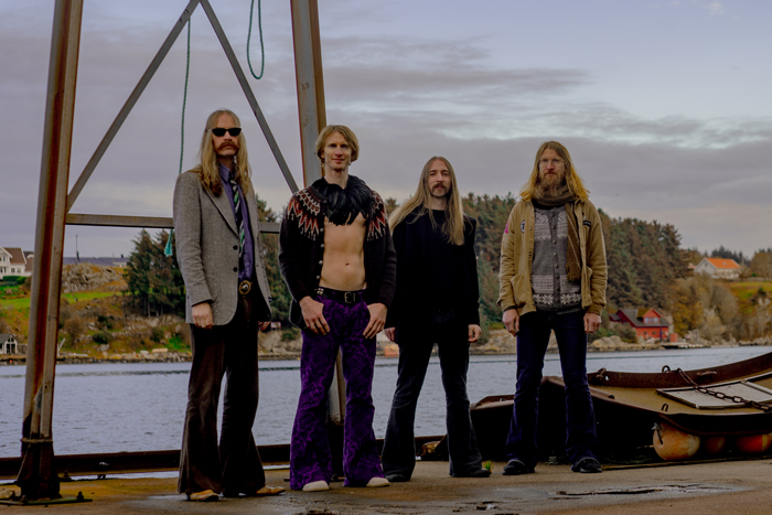Tusmørke band photo outdoors.