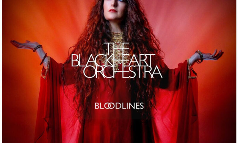 The Blackheart Orchestra – Bloodlines cover artwork. A photo of a woman in a red dress.