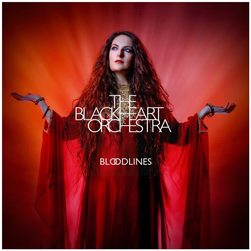 The Blackheart Orchestra – Bloodlines cover artwork. A photo of a woman in a red dress.