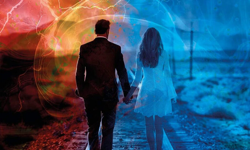 The album cover for Relations – The Foundation features a man and a woman holding hands as they walk down a railroad track. The image is split into red tones on the left and blue tones on the right. Abstract light patterns and energy-like textures overlay the scene. The title is set in clean white text at the top left.