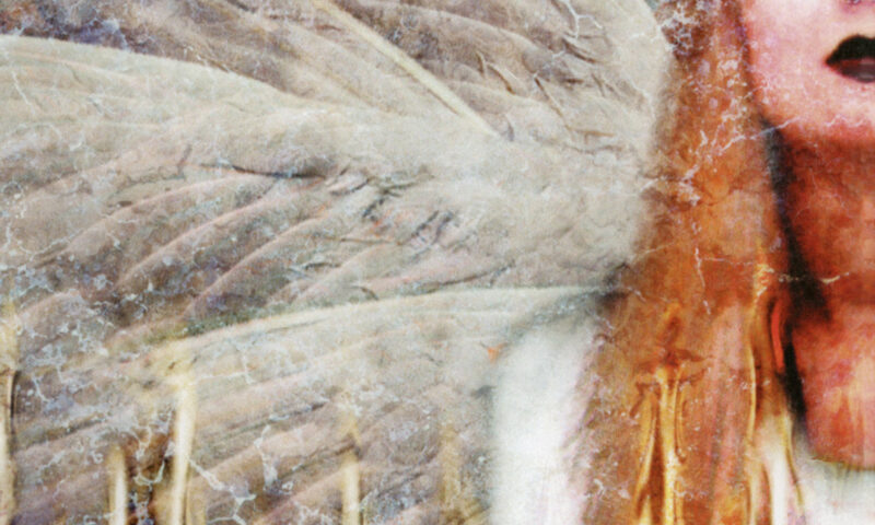 White Willow - Sacrament cover artwork. A partial view of an angel.