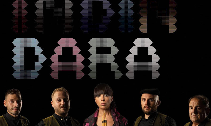Zoe Pia and Tenores di Orosei – Indindara cover artwork. A photo of the artists.