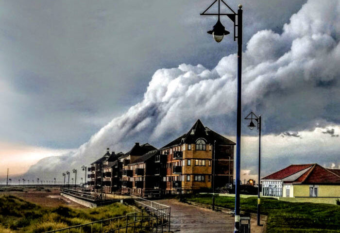 Brendan Perkins – "Favorite Places cobver artwork. It shows a road leading to apartment buildings.