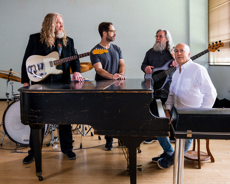 Echolyn band photo in the rehearsal space